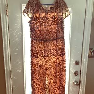 Formal gown never worn. Size 18